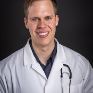 a professional and visually appealing image of a young happy smiling caucasian doctor with white teeth 282 300x300