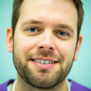 a professional and visually appealing image of a young happy smiling caucasian doctor with white teeth 935 300x300