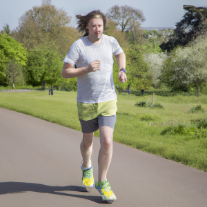 a professional appealing image of a caucasian man or woman jogging on a sunny day