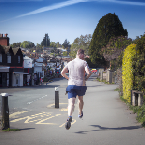 a professional appealing image of a caucasian man or woman jogging on a sunny day 411 300x300