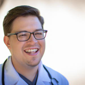 a professional and visually appealing image of a young happy smiling caucasian doctor with white teeth