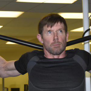 a professional appealing image of a caucasian man or woman exercising in a gym