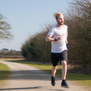 a professional appealing image of a caucasian man or woman jogging on a sunny day